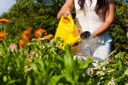 Technician checking and maintaining garden machinery